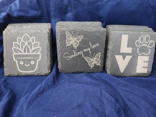 Set of 4  slate coasters with engraved designs